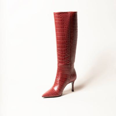 Red croco printed leather boots with stiletto heels. 
